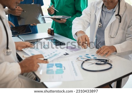 concept of mobilizing ability of medical team in conference room to diagnose and treat disease correctly. medical team joins meeting and discusses  patient illness in order to treat it correctly 