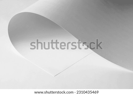 Large sheet of white paper. Black and white image.