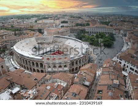 Panoramic aerial view of Verona at sunset with the Verona Arena in the center. Veneto, Italy Royalty-Free Stock Photo #2310439169