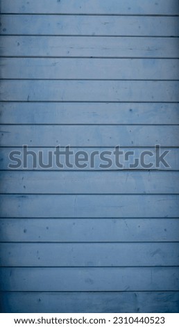 wooden planks painted in blue, ideal for backgrounds and textures