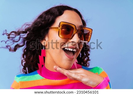 Beautiful young hispanic woman with diastema with colorful and cool style - Confident and interesting female with diverse and unique style, concepts about fashion, individuality and body acceptance Royalty-Free Stock Photo #2310456101