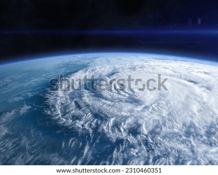 Blue Earth in the space. Hurricane seen from the space over planet Earth. Storm, hurricane, typhoon - concept cataclysm. Elements of this image furnished by NASA.
