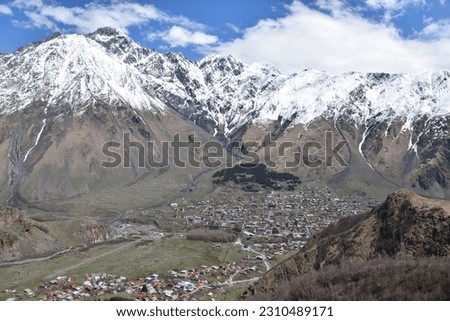 Village of Stepatsminda in the High Caucuses of the Republic of Georgia Royalty-Free Stock Photo #2310489171
