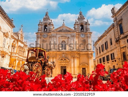 Wide view of Saint Paul Cathedral architecture in Mdina village of Malta on a sunny day in Europe Royalty-Free Stock Photo #2310522919