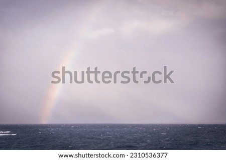 A rainbow over the ocean