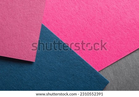 colored paper in layers for banner background.multicolored paper with texture close-up for background.