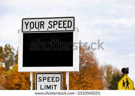 Radar speed trailer in residential neighborhood. Speeding ticket, speed limit and school zone safety