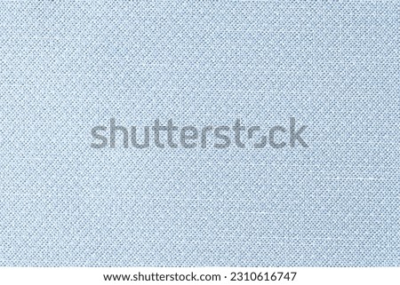Light blue textile with pattern designed for sale in atelier. High-quality fabric material texture as background. Catalog photo sample
