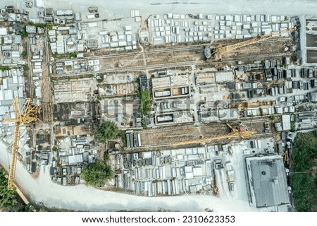 large storage of construction materials. industrial city zone from above. drone photo.
