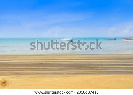 Wooden board on table with shadows, display podium for product mockups 3d trade show display advertising, Nature blurred sea and  background