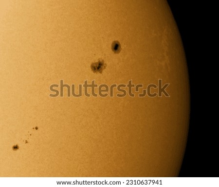 Closeup on the suns surface with sunspots on 30th of May 2023 Royalty-Free Stock Photo #2310637941