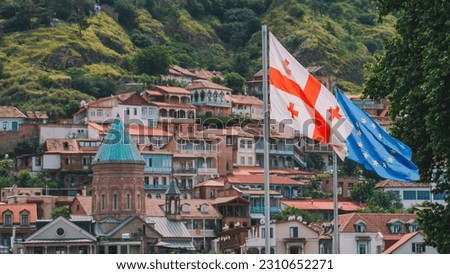 City Tbilisi with Georgian and EU flags Royalty-Free Stock Photo #2310652271