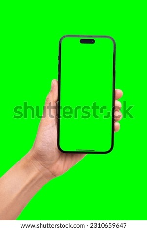 Hand holding smartphone set with green  for VDO editer and modern frameless design in two rotated perspective positions - isolated and Clipping Path
