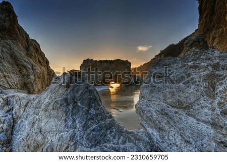Sunset at El Matador Beach, Malibu, California. Royalty-Free Stock Photo #2310659705
