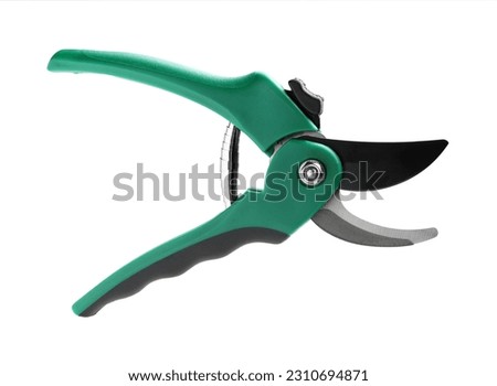 Secateurs with green handles isolated on white, top view. Gardening tool Royalty-Free Stock Photo #2310694871