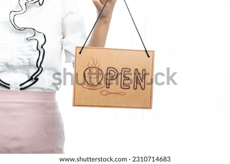 woman holding open signboard white background