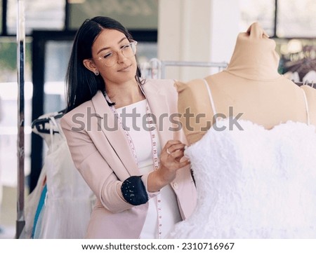 Fashion, designer and mannequin with woman in store for creative, planning and fabric. Clothes, tailor and sewing with female employee and wedding dress for small business, boutique and manufacturing