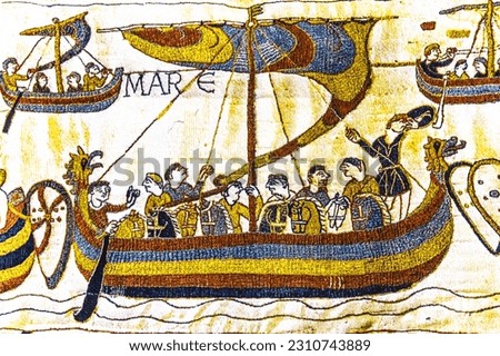 Bayeux tapestry, bayeux, normandy, france. created 11th century right after battle of hastings 1066 ad showing norman conquest. norman invasion ship Royalty-Free Stock Photo #2310743889
