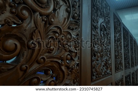 The parapet of carved wood with a certain pattern. Beautiful wood carving