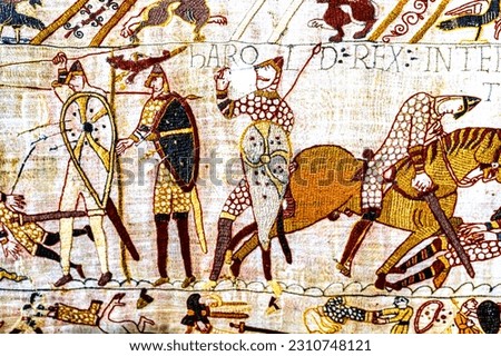 Bayeux tapestry, bayeux, normandy, france. created 11th century right after battle of hastings 1066 ad showing norman conquest. death of king harold. Royalty-Free Stock Photo #2310748121
