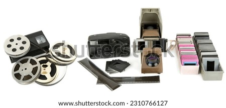 Camera, film strip, projector and slides isolated on white background. Collage. Wide photo.