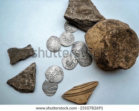 Treasure of silver coins of the 15th century - dangi, Eastern Europe, Golden Horde. Artifact, archaeological discoveries, search for treasures and artifacts.