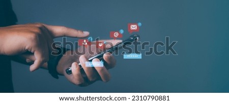 Young man using smartphone with social media to interactions icon on internet post. Data and marketing concept. Social media and digital online on mobile phone.