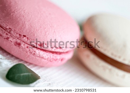 Pink, white Macaroons close-up, tender pastel background. Selective focus. Romantic morning
