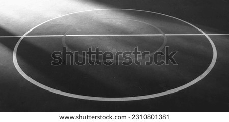 Lines, abstract sports background or texture on outdoor sports field. Black and white lines on the sports field (black and white shooting)