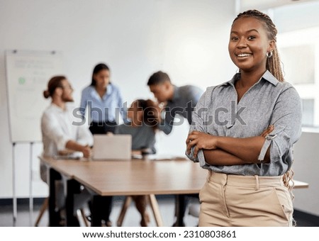 Portrait, leadership and arms crossed with a business black woman in the office for a strategy meeting. Management, smile and a happy female leader standing in the workplace with a team of colleagues Royalty-Free Stock Photo #2310803861