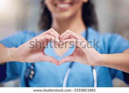 Happy woman, doctor and heart shape hands for love in healthcare or life insurance at the hospital. Female person or medical professional showing hand loving emoji, symbol or sign gesture at clinic