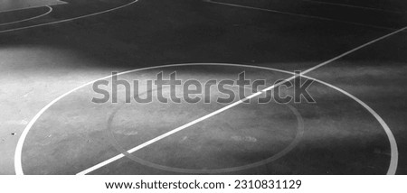 Lines, abstract sports background or texture on outdoor sports field. Black and white lines on the sports field (black and white shooting) Royalty-Free Stock Photo #2310831129