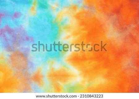Abstract tie dye multicolor fabric cloth Boho pattern texture for background or groovy wedding card, sale flyer, 60s, 70s poster, kid tie-dye diy backdrop. Modern Watercolor Wet Brush Fabrics Art Royalty-Free Stock Photo #2310843223
