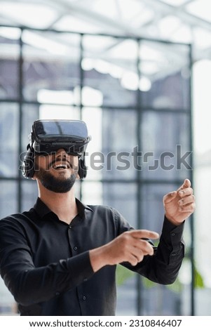 Businessman in virtual reality glasses or headset