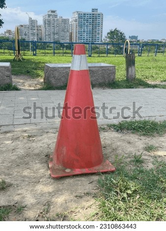 Taipei street photography -
Red triangle cone in the park