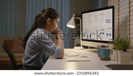 Asia people young woman study hard overnight brownout bored remote learn online read data tired sitting head in hands at home office desk workplace think worry in job tough stress workforce issue. Royalty-Free Stock Photo #2310896343