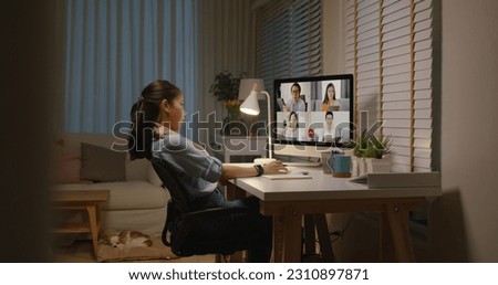Young asia female busy late night work hard video call online remote group talk stiff neck relief pain ache sit on desk computer in chronic suffer burnout brownout office syndrome workforce at home. Royalty-Free Stock Photo #2310897871