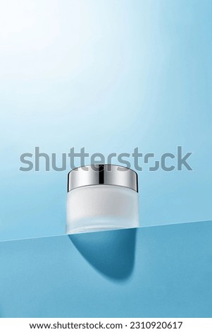 White skin care face cream bottle sunshine shadow