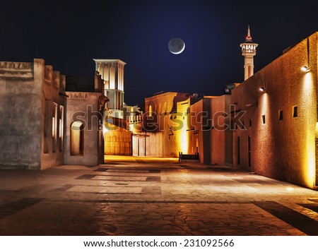 Night view of the streets of the old Arab city Dubai UAE Royalty-Free Stock Photo #231092566