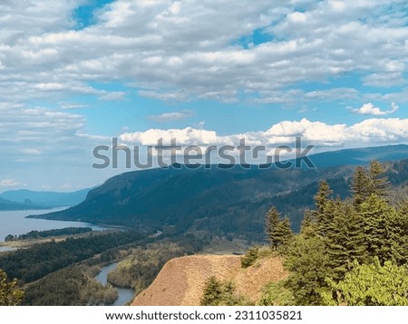 The Columbia River Gorge and Oregons beautiful foothills against the afternoon sky. 