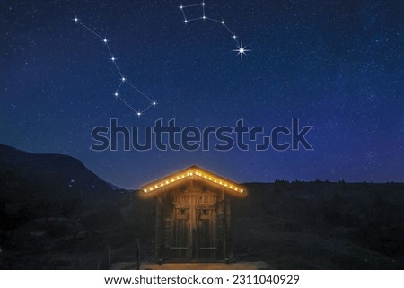 A real night scene on a mountain hut with starry sky showing constellation of big dippper and little dipper and the North Star, in May, North sphere (Polaris finding guide) Royalty-Free Stock Photo #2311040929