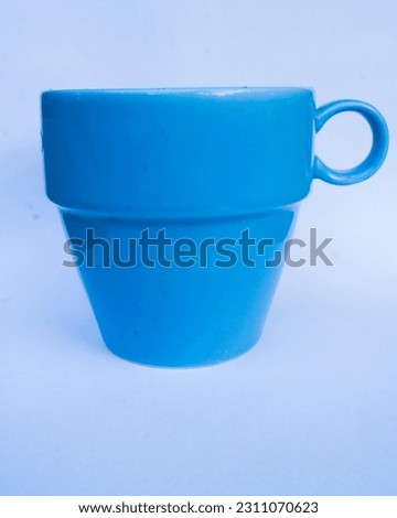 a plain glass cup on a white background
