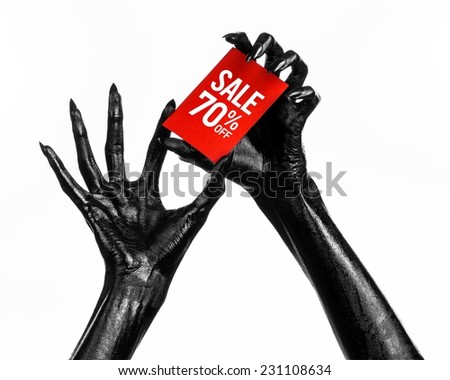 Hot sale topic: black hand holding a red card with 70% discount on white background