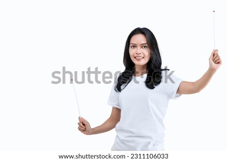 Asian woman holding an empty stick isolated over white background. Empty stick for your flag design
