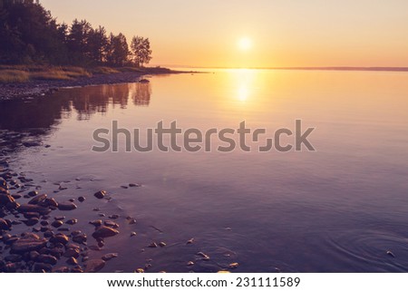 Sunset scene on lake Royalty-Free Stock Photo #231111589
