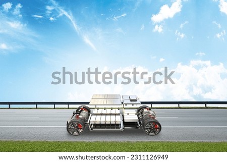 Electric vehicle chassis on the road. EV chassis. EV battery. EV powertrain on road Royalty-Free Stock Photo #2311126949