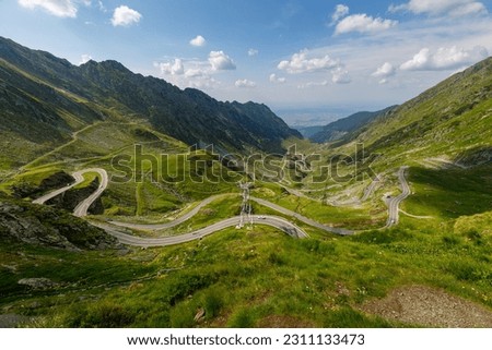 The carpathian mountains with the winding transfaragasan road Royalty-Free Stock Photo #2311133473