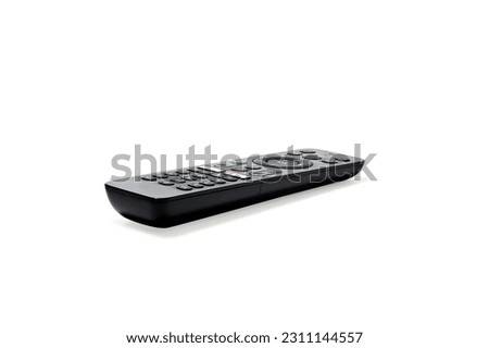 Perspective view of television and audio remote control isolated on white background Royalty-Free Stock Photo #2311144557