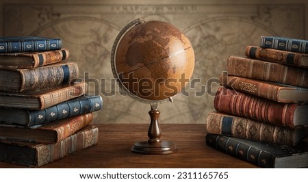 Old geographical globe and map and old book in cabinet. Science, education, travel background. History and geography team. Ancience, antique globe on the background of old map. Royalty-Free Stock Photo #2311165765