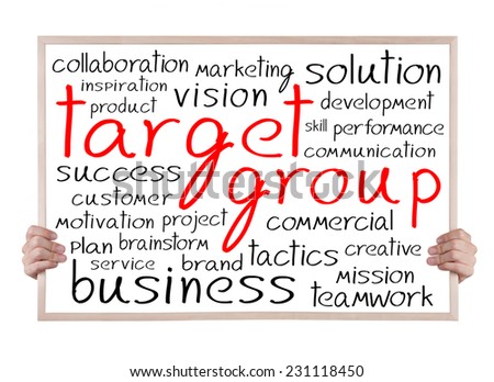 target group and other related words handwritten on whiteboard with hands